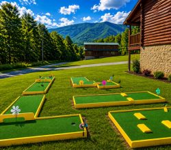 Five‑hole putt‑putt golf course with scenic mountain views, lush green turf, wooden borders, and clear blue skies — perfect for family outdoor recreation and vacation activities